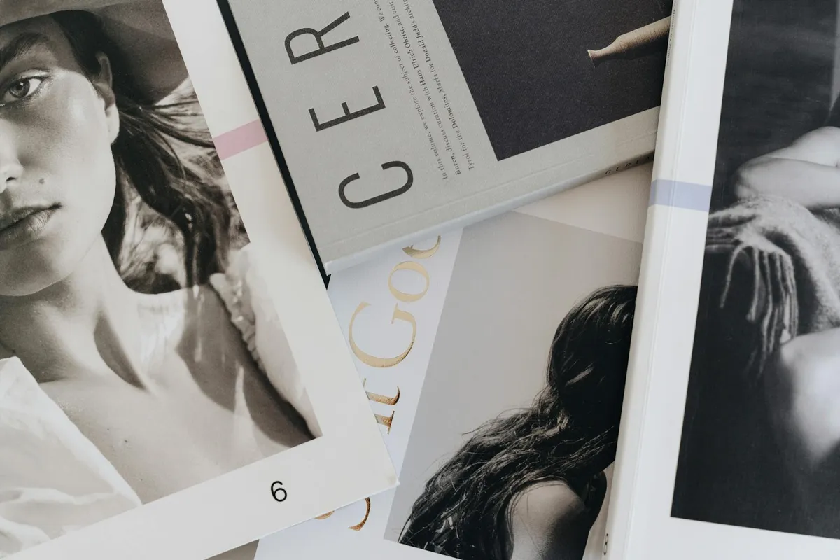 A fashion portfolio book displayed open